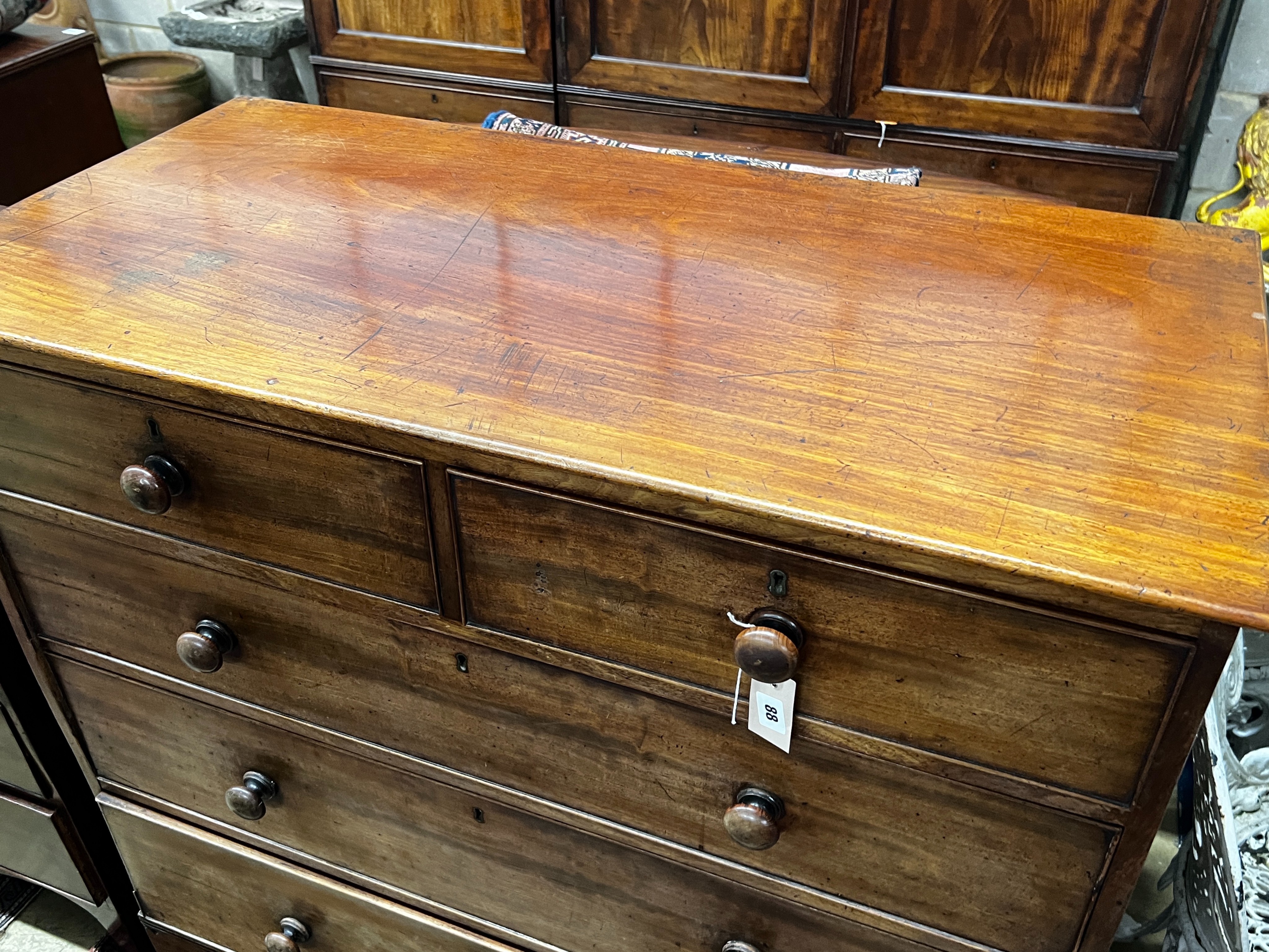 A Regency mahogany chest of two short and three long drawers, width 109cm, depth 54cm, height 108cm